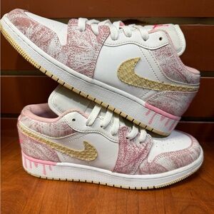 Nike Pink and White Sneakers with Gold Accents